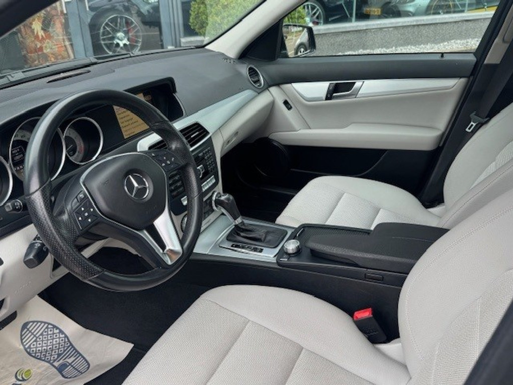 Mercedes-Benz C-Klasse 180 Business Class Avantgarde l Airco l Tempomaat l Regensensor l PTS l COMAND APS l 45938137-1.jpg | Sterdome B.V.