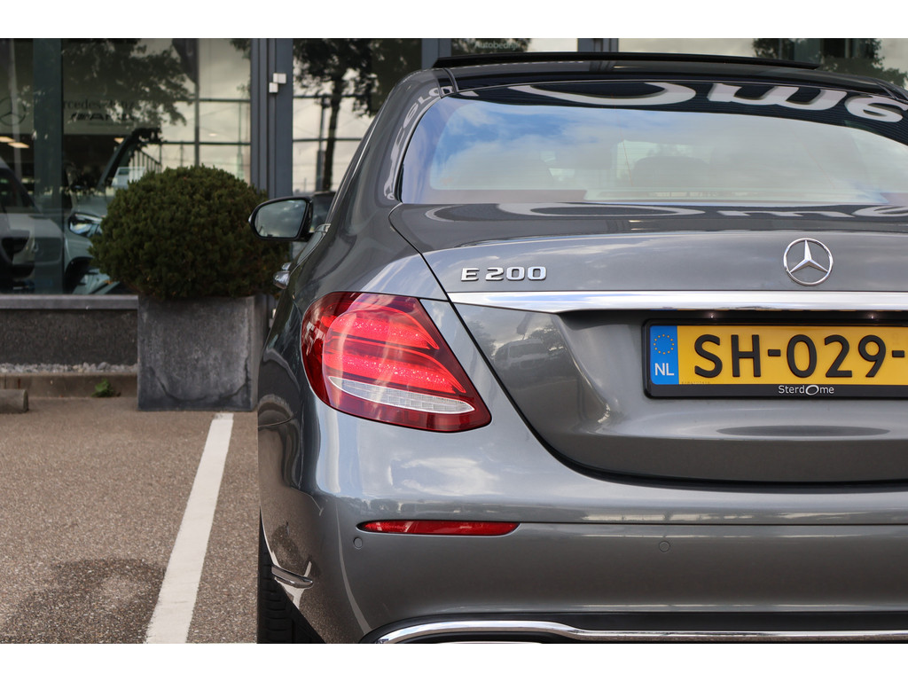 Mercedes-Benz E-Klasse 200 Exclusive l AIRMATIC luchtvering l Panoramadak l Memory l Burmerster l DISTRONIC l LED intelligent l Comand l Sfeerverlichti 47684498-28.jpg | Sterdome B.V.