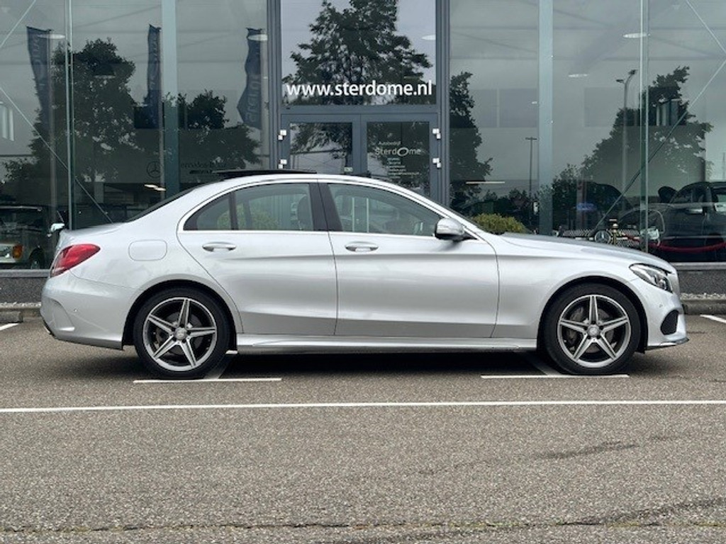 Mercedes-Benz C-Klasse 180 Ambition l AMG l Panoromadak l Luchtvering Airmatic l Camera l Leder Twin l LED l Airconditioning l PTS l 47955148-52.jpg | Sterdome B.V.