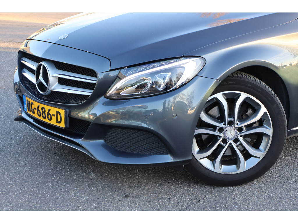 Mercedes-Benz C-Klasse Estate 200 Ambition I Trekhaak I Camera I Stoelverwarming I Led I Tempomaat I Half leder I Elektrisch bedienbare achterklep l PT 50818698-2.jpg | Sterdome B.V.