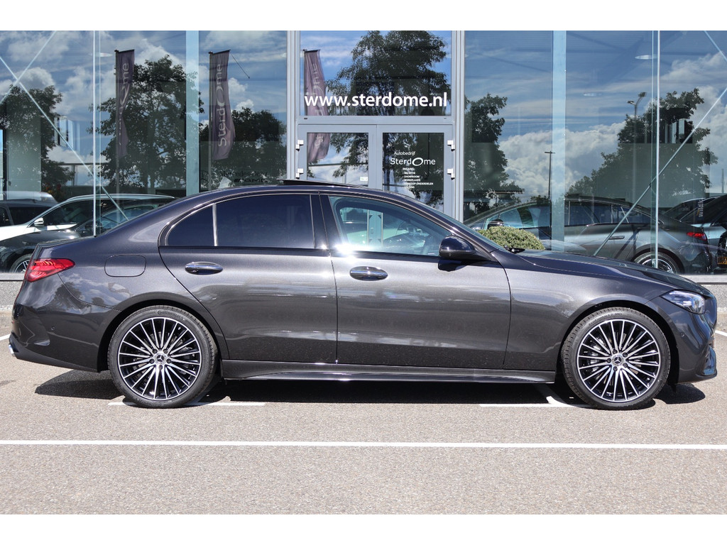Mercedes-Benz C-Klasse 300 e 140 Years Edition l AMG line l Panoramadak l Smartphone integratie l MBUX l Parkeerpakket met 360 gr Camera l Memory l Keyless Go met Verzonken handgrepen l 56656651-2.jpg | Sterdome B.V.