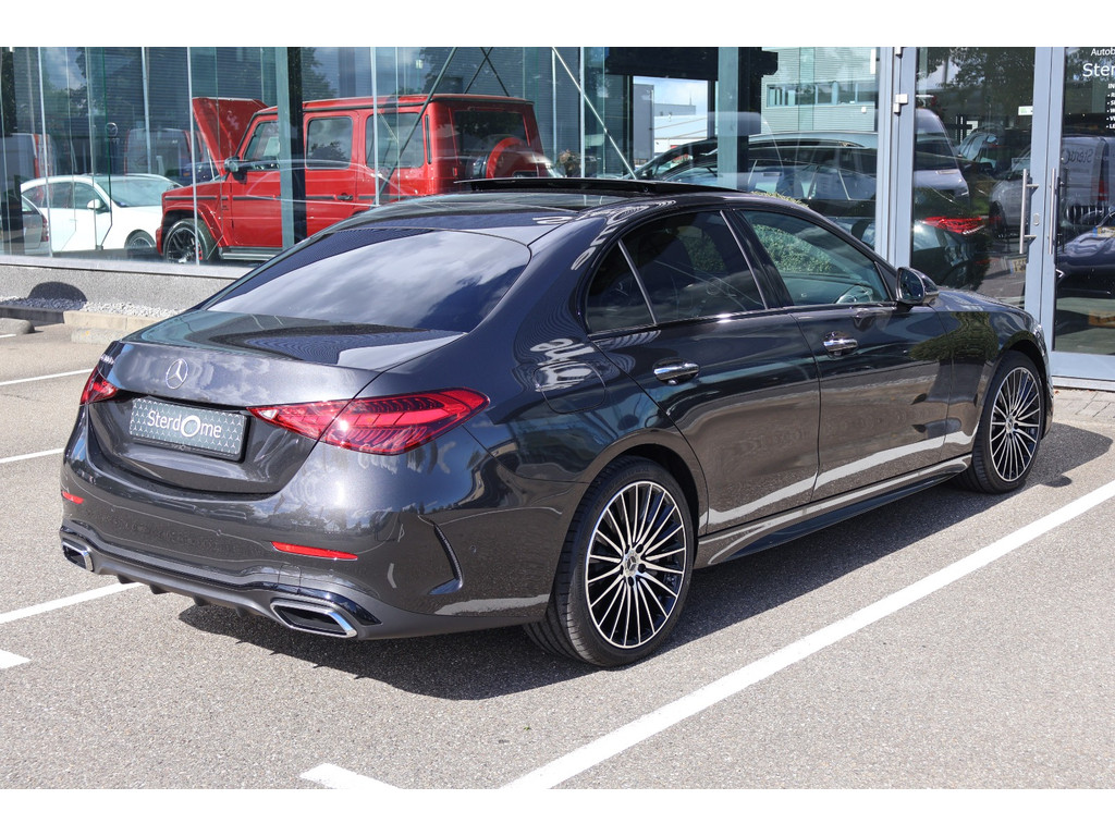 Mercedes-Benz C-Klasse 300 e 140 Years Edition l AMG line l Panoramadak l Smartphone integratie l MBUX l Parkeerpakket met 360 gr Camera l Memory l Keyless Go met Verzonken handgrepen l 56656651-3.jpg | Sterdome B.V.
