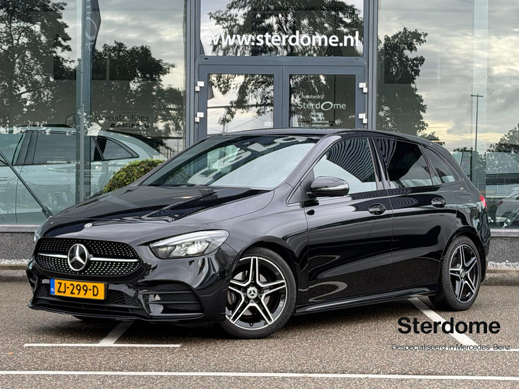 Mercedes-Benz B-Klasse 180 Business Solution AMG l Trekhaak l MBUX l Stoelverwarming l Virtual Cockpit l Smartphone Integratie l Spiegel pakket l LED High Performance l Airconditioning THERMOTRONIC l Night pakket l 57010644-0.jpg | Sterdome B.V.