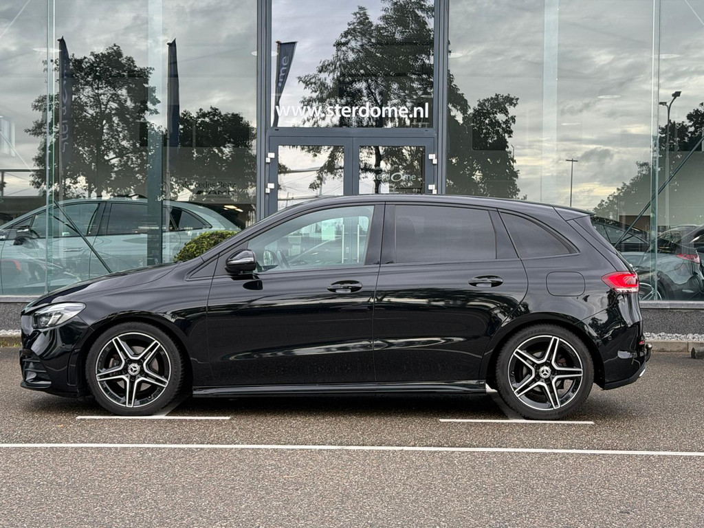 Mercedes-Benz B-Klasse 180 Business Solution AMG l Trekhaak l MBUX l Stoelverwarming l Virtual Cockpit l Smartphone Integratie l Spiegel pakket l LED High Performance l Airconditioning THERMOTRONIC l Night pakket l 57010644-4.jpg | Sterdome B.V.