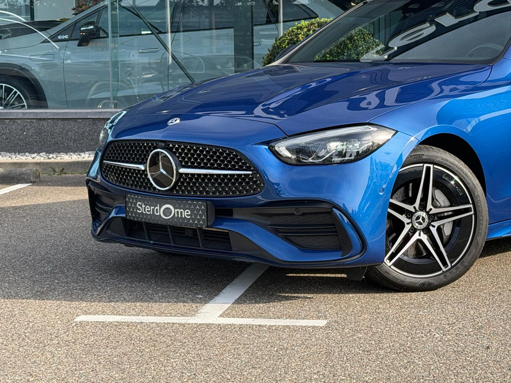 Mercedes-Benz C-Klasse Estate 300 e AMG Line l Panoramadak l LED l MBUX l Distronic l Niveauregeling l Smartphone integratie l Sfeerverlichting l Camera l 57154473-3.jpg | Sterdome B.V.